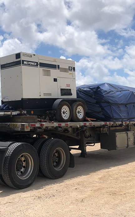 Spokane flatbed trailer with fully tarped load